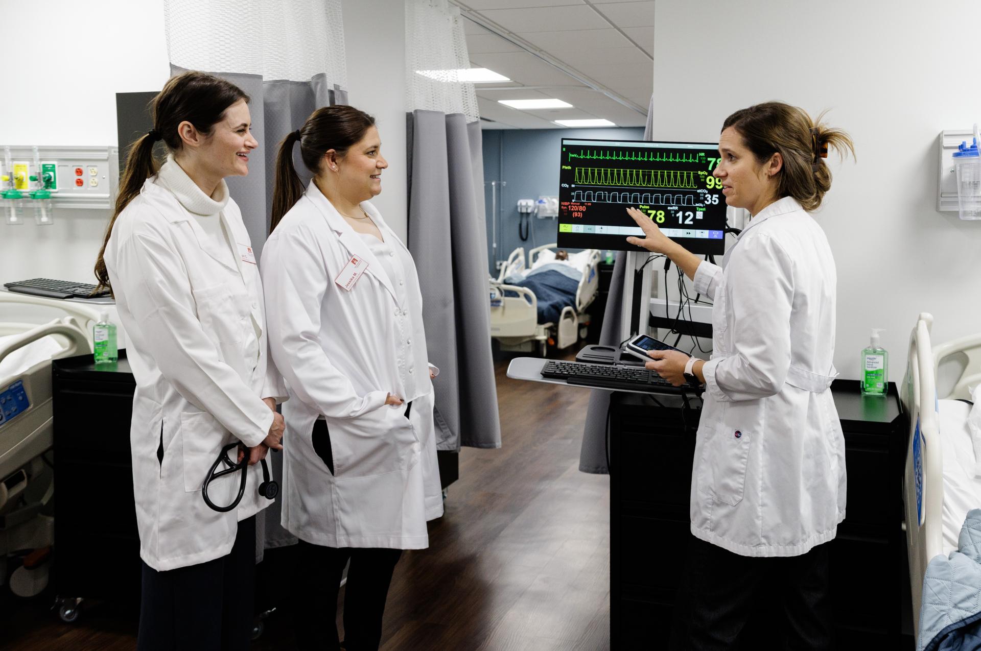 Nursing students and professor in North Central College's Nursing Skills Lab